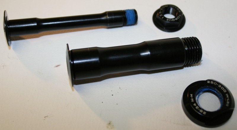 Tapered aluminum main pivot axles. Note the torque numbers on each nut or bolt.