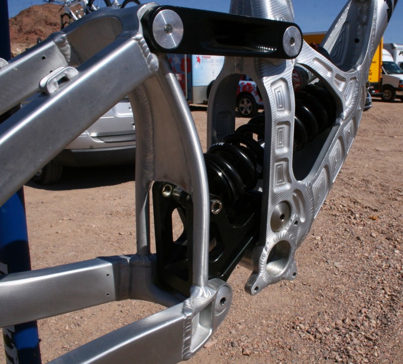 A captured lower pivot and internal ribs within the chainstay in the name of stiffness
