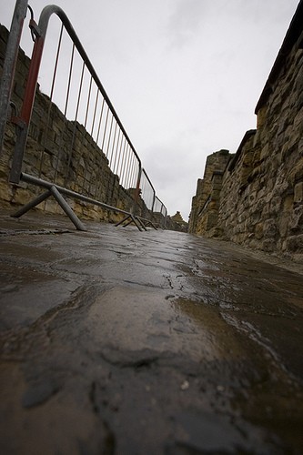 Cobbles, slippery when wet.