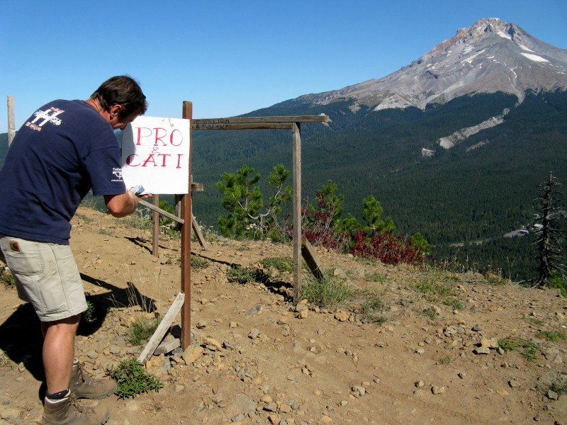 Petr of Hurricane Racing finalizing the track with signage.