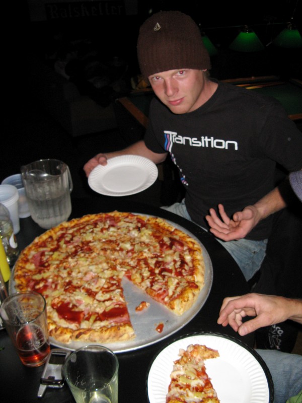 Kyle Thomas scarfing down pizza-pie!