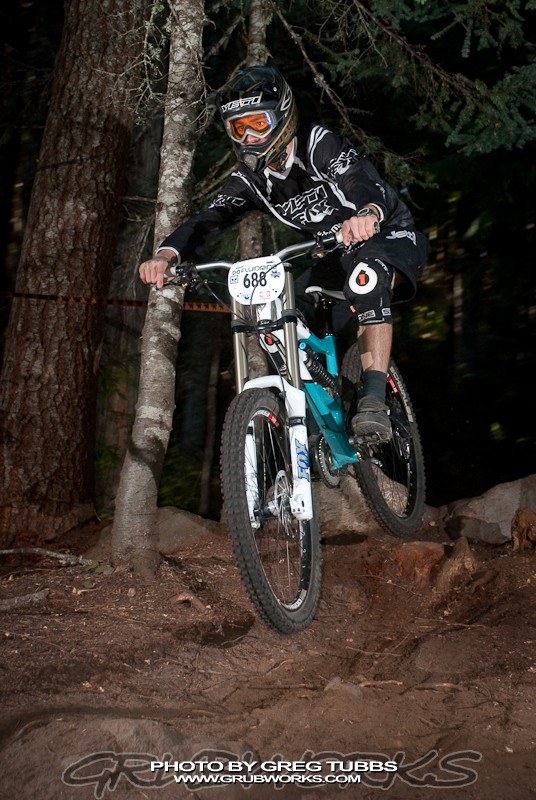 Lower down the course, Yeti/Fox Racing's Evan Powell still moving at high rate of speed.