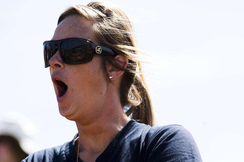 Why does she have her mouth open?