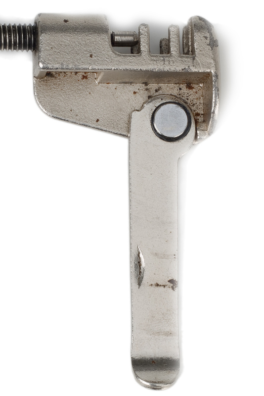 This chain tool has both an inner position to help loosen stiff links and a standard outer <br> position to drive the chain pin in or out.