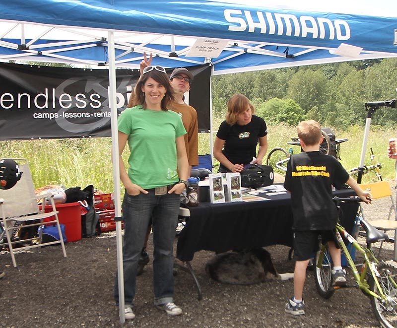 Kelli of Endless, Danielle taking care of registration, Shannon photo-bombing