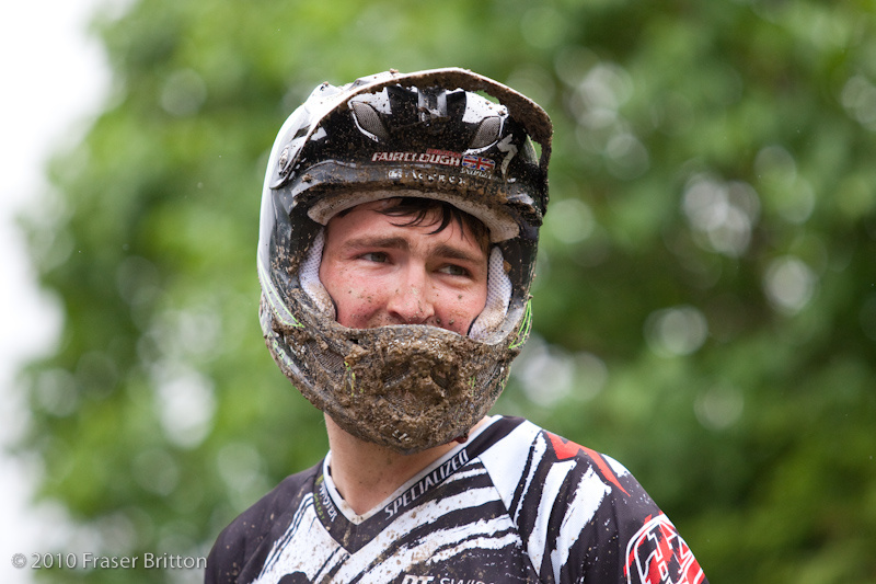 Brendan is all smiles despite the mud.