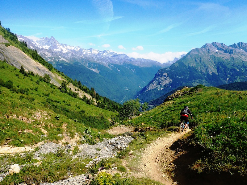 Carrying on the singletrack into the view below