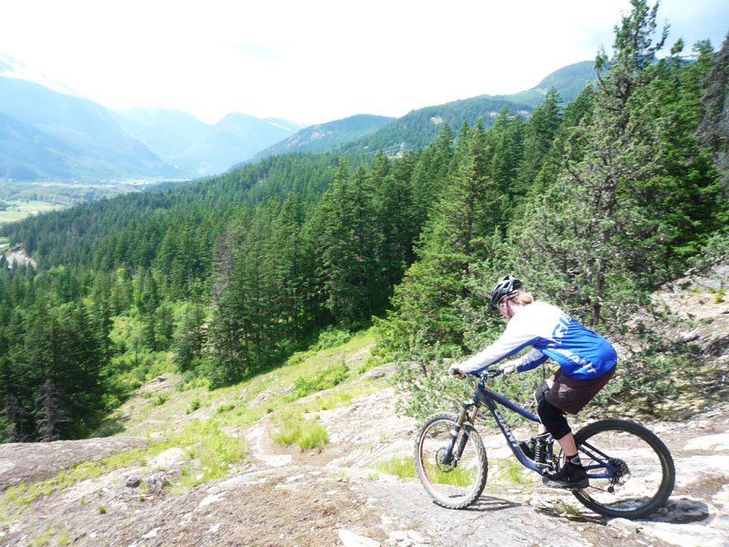 Ever ridden Grumpy Grouse in Pemberton? If you aren't going to ride this section you better hope that you have some sticky soled shoes to walk down it! Sharon about to roll over the knuckle and into the silliness - Hell ya!