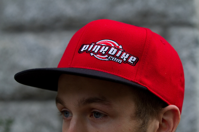 Red with a black brim