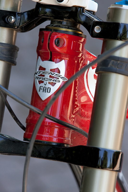Intense always has the racer in mind. The upper headset cup is held in place with a single pinch bolt. If you need to make an angle change, simply loosen the bolt and drop in one of the three Cane Creek AngleSet cups. The system sounds easy enough that one could easily make changes between runs to see the effect - no hammers or headset presses needed.