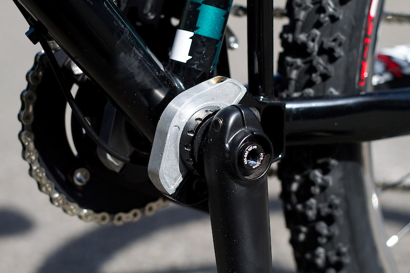 The concentric bottom bracket is the key to being able to run a single speed setup on a full suspension bike without resorting to using a spring loaded chain tension device. Because the swingarm pivots directly off the bottom bracket shell the distance from it and the rear axle remains constant as the bike goes through it's travel. No funky bolt-on chain tension bits are required. If you want to run gears you'll need to use some sort of chain guide up front which can be mounted on the Bolt's ISCG05 tabs. Have they thought of everything?