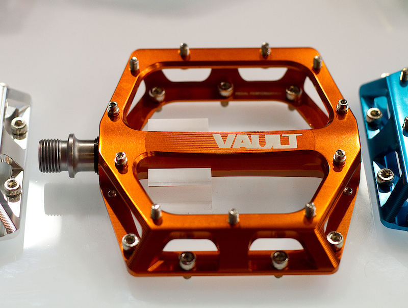 DMR's new Vault pedal. The Vaults are set to be DMR's premium pedal, being both thinner and lighter than their previous designs. Don't panic, the classic V12 and V8 pedals that many of you know and love will still be available, but the Vaults will be taking it to the next level. When looking at the Vault from above it is easy to see what Tom was explaining in the video about the pedal shape. When your foot is on the Vault the widest part of the body will be directly under the ball of your foot, behind that point it tapers down slightly where material isn't needed. Not only does this make for a lighter design, but it also means that the leading edge of the underside of the pedal is less likely to strike anything as it is smaller than the upper deck that your foot is resting on. Clever work.