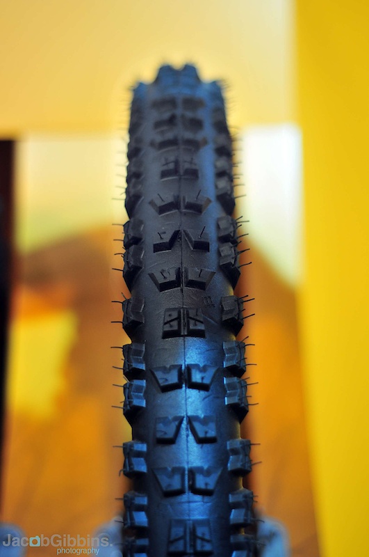 Der Kaiser.  This is one of the super soft compound downhill tyres that's been around for a little while now and is finally beginning to find its way onto the bikes of more and more riders.  Aimed at the drier trails the Kaiser features stiff six-ply sidewalls and a constant band of edge knobs to hold you steady in the turns.  Claimed weight is 1200g and they don't come in far off this at 1268g on our scales.  We've been running these all season on trails throughout Europe and will be covering them in more detail soon, but it's safe to say that their increasing popularity is deserved.  It's worth pointing out that these are the 'full fat, top of the tree' versions which are definitely pricey.  But alongside this model Continental also had another line of tyres using a more traditional rubber compound to bring the cost more in line with the likes of Maxxis.