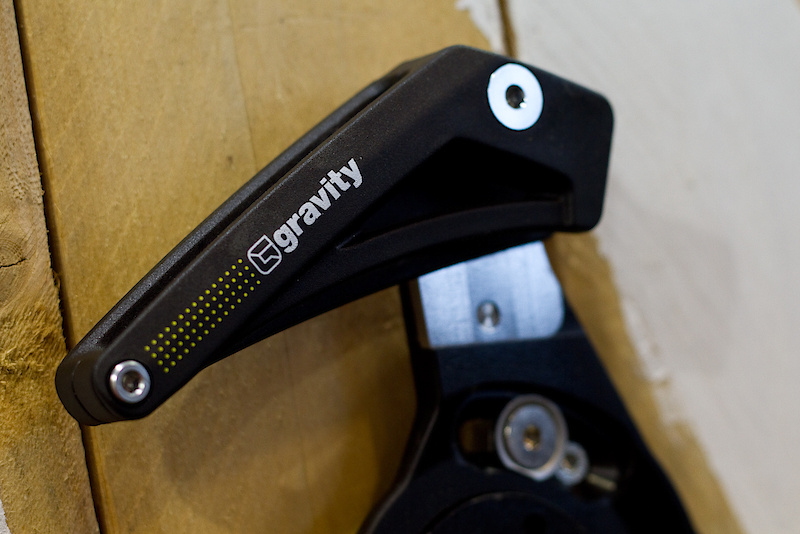 Gravity uses Dupont's Hytrel composite for the guard, lower guide, and upper guide piece. The material is designed to have enough give in order to prevent it from breaking, but be strong enough to stand up to hard everyday use. Sounds like interesting stuff.