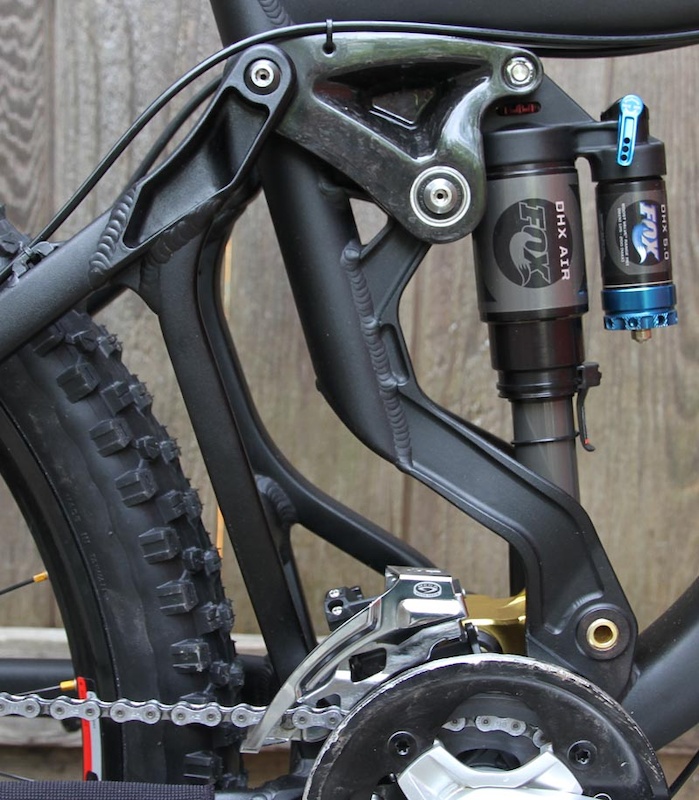 A closer look at the business end of the Firebird. Take note of the carbon fiber upper link and quality pivot hardware. Hidden from view is the floating front derailleur that tracks the chain through the bike's travel.