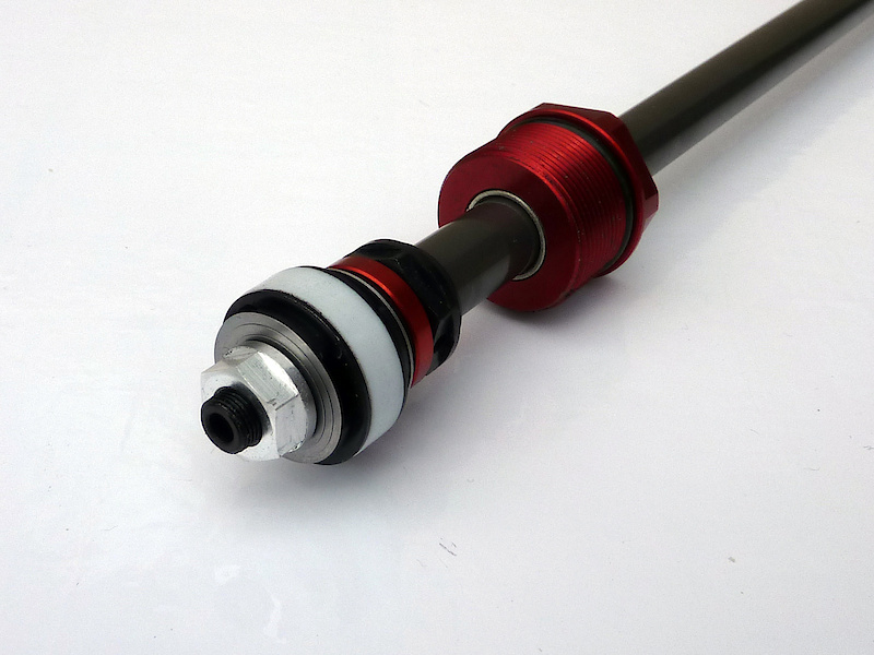 The two photos above show the Elka Stage 4 cartridge's compression and rebound assemblies.