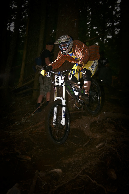 Orange/POW Gloves/Chromag's Derek Batchelder took a 3rd with a full off bike crash, hitting his head and puked as he climbed back onto his bike. Let's say the helmet he's wearing is now in the trash.