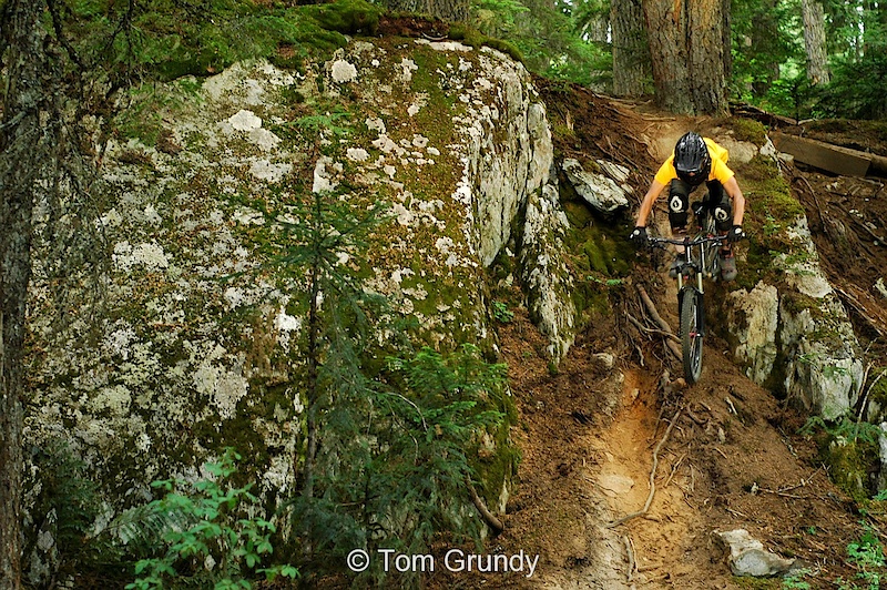 Throwing his bike down one of the Facrobat roll in's, Photo by Tom Grundy