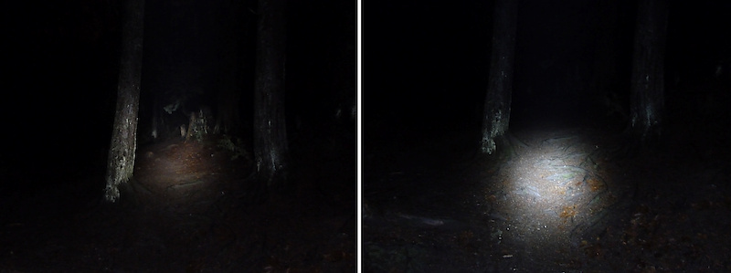 <span style='font-size:16px'>Low beam and high beam comparison, looking up slope (helmet mount), trees at about 5m. 1600 iso</span><br><br>Maximum temperature after three hours (without a fan running to simulate air movement) reached 79C (39C for the battery pack) in a stationary test, but under real riding conditions with air flowing over the lamp temperatures averaged 38-40C (22C for the battery) during a 2h ride (this included the mode button). The mode button offers three click options, low beam, high beam, and blink, holding the button down turns off the light. Officially the mode button glows green (100-20%), turns amber (20-10%), then red (10-0%) before the light shuts off. In testing, based on duration of burn time, the mode button glows green (100-5%), amber (5-1%), red (1-0%). Once the mode light turns amber there is at most 10 minutes before it turns red, and the lamp switches off about 2 minutes later. The light has a strong hot spot, making this more a spotlight than a floodlight. At one meter the light cone measures1.85m across, with a hot spot of 40cm (the inner 8cm being blindly bright). At two meters the light radius is 3.7m, with a visible hot spot of 80cm.