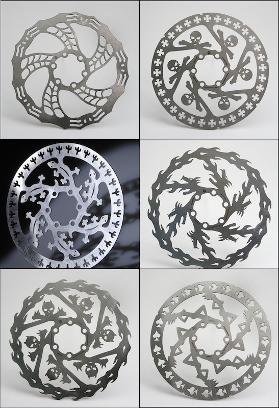 Dirty DogMTB has a number of rotors to choose from depending on what you're looking for, from skulls and spiders webs to fire breathing dragons.<br><br> <span style='font-size:19px'>Rotor details:</span> <br><br> 160 mm - 147 g - $68.95 USD<br> 185 mm - 186 g - $74.95 USD<br> 203 mm - 248 g - $79.95 USD(203 mm Shimano Saint rotor weighs 197 g)<br>160 mm Rohloff compatible - $74.95 USD<br>160 mm stamped rotor - 109 g - $38.95 USD</span>