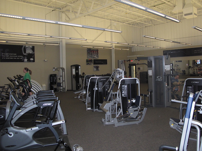 <span style='font-size:18px'>Trek's in-house gym</span><br><br>Employees at Trek's HQ are encouraged to take time out of their day to leave their desks and squeeze some exercise in. There is an impressive amount of equipment in this room, as well as motivational quotes from Lance and Willow Koerber about pain, glory, and all those inspirational sorts of things. Fitness trainers are also made available for staff to take advantage of. Trek's private trails and testing area, where you'll find about 18 miles of professionally made trails, is located just a mile down the road as well. I spent the majority of the day touring Trek's headquarters and didn't run into a single person who looked out of shape.