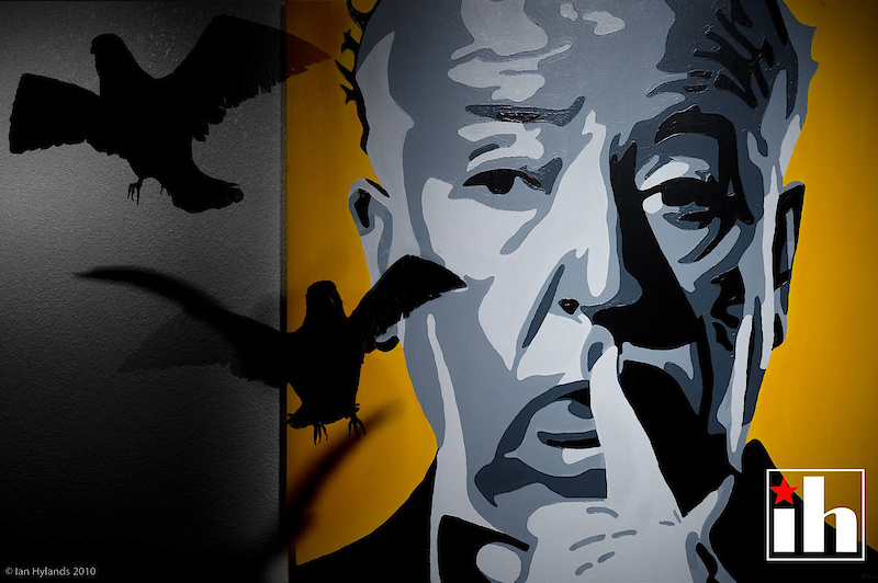Eric painted this photo of Alfred Hitchcock that hangs in the stairway, I added the crows with multiple exposures, no photoshop involved.<br><br>I've been pretty good friends with Eric and Sadie since the beginning, and I listened when he called me up to talk about it. We had different ideas about the kinds of photos that we wanted to get, but we discussed it at great length a few times, and a plan started to come together. More like misguided visions on my part actually, a plan suggests that you actually have an idea about what is going to happen, maybe even what you're going to shoot. I only knew the feel of how I wanted it, the style I wanted to shoot everything. I wanted to suggest the horror films that Eric's life has been steeped in, but in a kind of a pin up fashion style. Nothing too gory, just something that would make you look at it and think. B movie horror poster style, done well.<br>