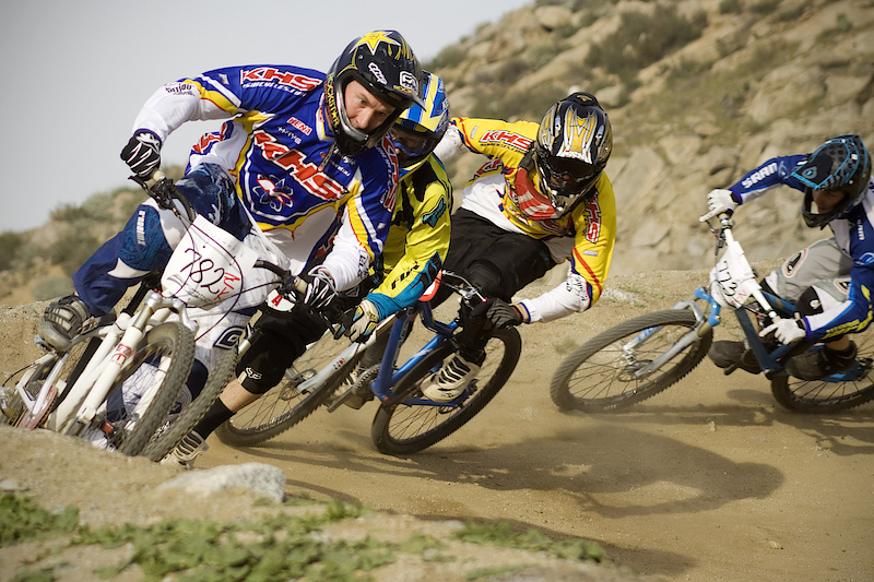 Holmes, Carter, Carney, and Graf rail through the berm in single file