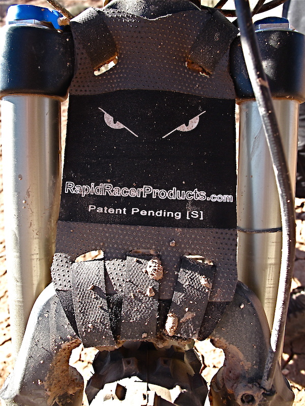Rapid Racer Products NeoGuard with Evil Eye graphics plastered with Utah's thick mud
