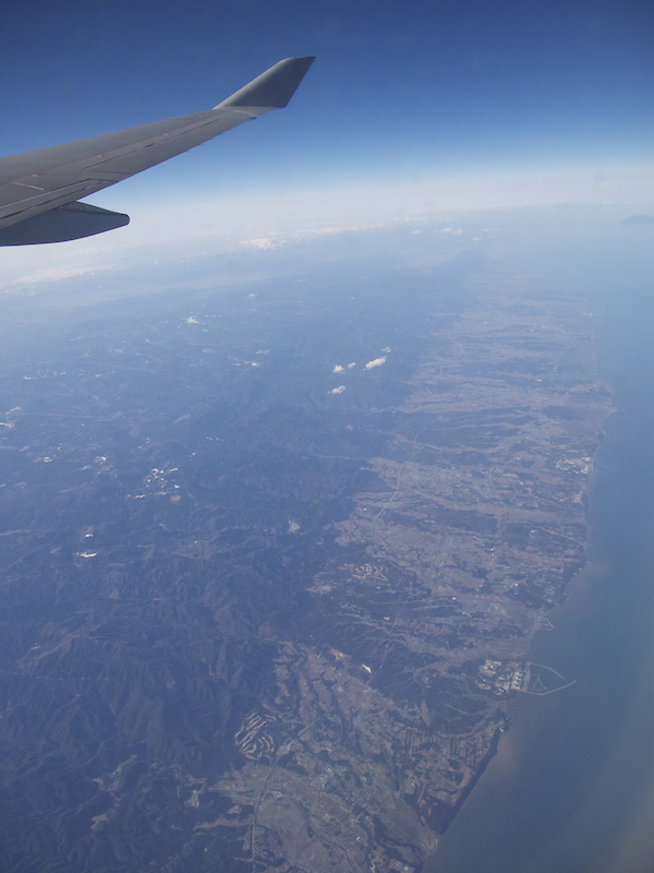 Our plane flew directly over Japan's earthquake and tsunami ravaged East coast and reminded us just how trivial bikes are in the grand scheme of things. Our hearts go out to everyone in Japan.