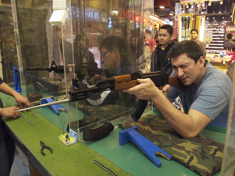 The night market is part restaurant, part flea market, and part shooting range? Karl does his best to take out as many invading balloons as possible. The booth's proprietors casually walked between the pellet guns as they were being fired, oblivious to losing an eye due to Karl's poor aim.