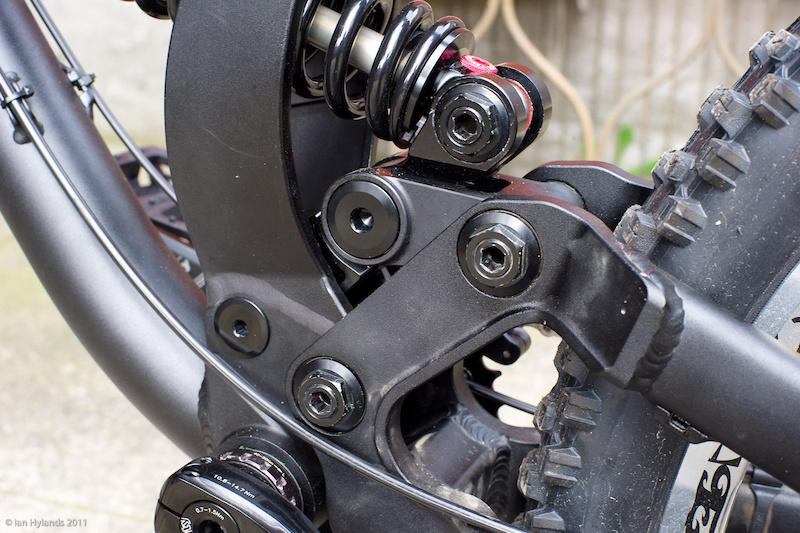 The single pivot swingarm uses a linkage to active the shock. The bike's designers have made an effort to have the suspension parts as low as possible in the frame. Aluminum pivot hardware is used throughout and it is worth noting that you can access all of the bolts without having to remove the cranks or chain guide. It is important to remember that it is the small details that can make all the difference in how a bike rides. Yes, the general layout is similar to some other sleds out there, but by changing the pivot locations by only a few millimeters, Diamondback's engineers can dial in the exact leverage ratios that they are looking for.