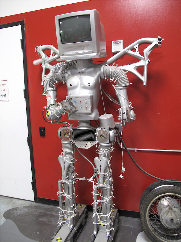Specialized is very serious about security. This guy was standing guard in front of the door where Sam Hill's carbon 29'er DH bike was being worked on. Not.