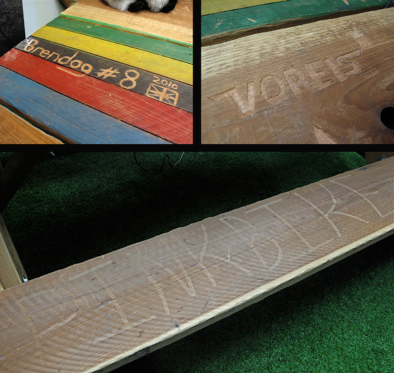 Guests who visit the Sam Hill room, including Kirt Voreis and Brendan Fairclough, have carved their names into the table - it would have been rude to not join them!