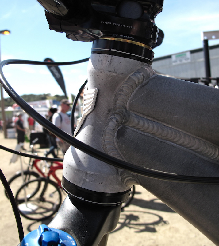 2.5 degrees of adjustment is possible by using an eccentric in both the upper and lower cups.