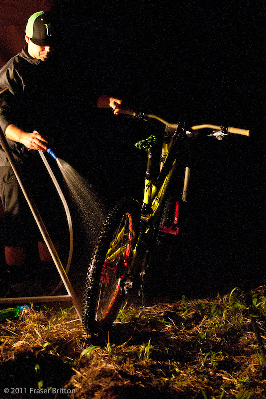 The heroes of the World Cup aren't the Racers, or even the organizers. It's the mechanics, soigneurs and managers who work late into the night to make sure that wheels spin straight and true the next morning. Washing bikes by headlights in the rain, not the most glamourous job, but one that has to be done. 