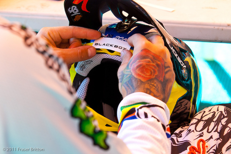 It's all about the details on the World Cup. Hill gets his fresh helmet ready to pair up with a fresh new rainbow jersey.