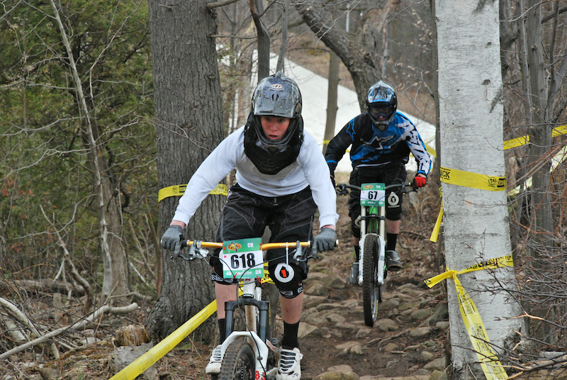  44. Adam Donlan in front of John French through the last rock garden at Kelso DH #1.
