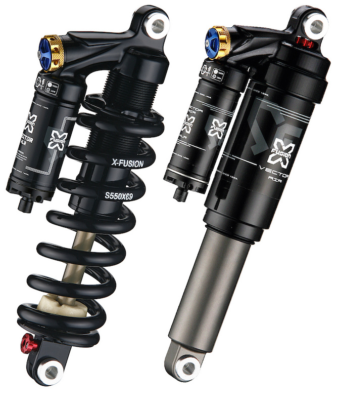 On the left is X-Fusion's well received Vector HLR coil over shock, on the right you'll find the new Vector Air. Both are fit for use on a downhill bike, although the Vector Air is claimed to be the lightest DH specific damper on the market.<br><br><span style='font-size:17px'>Vector HLR Air details:</span><br><br>- Air sprung shock built for downhill use<br>- High volume main air chamber means that the shock doesn't require an additional external air sleeve<br>- Adjustments: air spring pressure, piggyback air pressure, rebound, separate low and high speed compression<br>- Available in all popular sizes