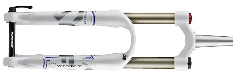 X-Fusion's Vengeance HLR fork was a sleeper hit in 2010, but it should be a more popular option now that more riders are aware of the fork's killer performance and competitive price. 2011 sees the fork get both an external travel adjustment and tool-less 20mm thru-axle added to its arsenal.<br><br><span style='font-size:17px'>Vengeance HLR details:</span><br><br>- Travel increased to 170mm (<i>internally adjustable to 150, 100, 80mm</i>)<br>- 7mm lower fork crown compared to the 2011 model<br>- DLA (<i>Down Low Adjust</i>) external hydraulic travel adjustment lowers fork by 30mm<br>- 20mm Syntace licensed thru-axle<br>- Larger air spring chamber for more linear stroke<br>- Faster rebound damping speeds (<i>slow range remains the same</i>)