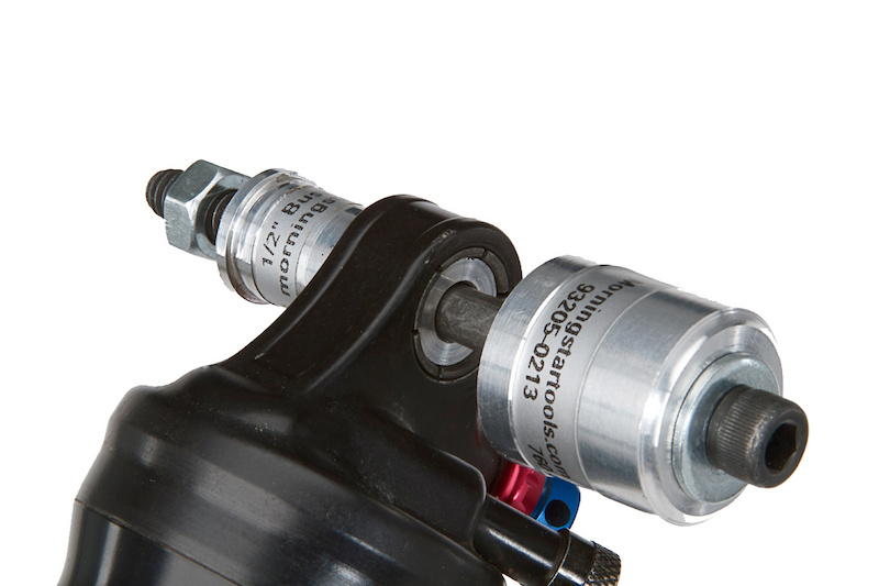 The tool's punch is stepped to allow it to fit inside the bushing, with the outer, larger diameter section resting on the edge of the bushing. This ensures perfect alignment every time.