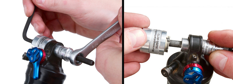 The tool presses the bushing out into the cup on the opposite side of the shock eyelet.