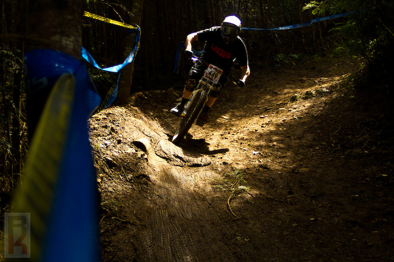 Sam Isett coming around the corner in epic lighting!