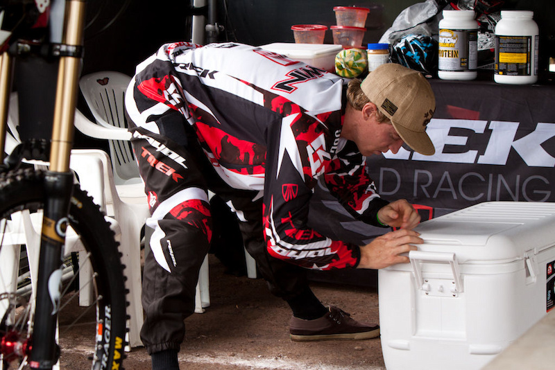 Aaron Gwin stretches before practice on Friday