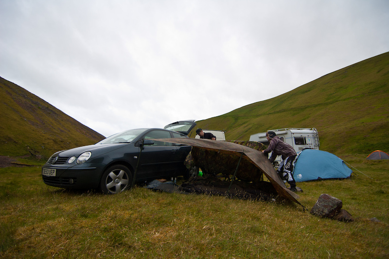 Always prepared, a broken tent didn't stop the squaddies getting some sleep, despite the wind and rain