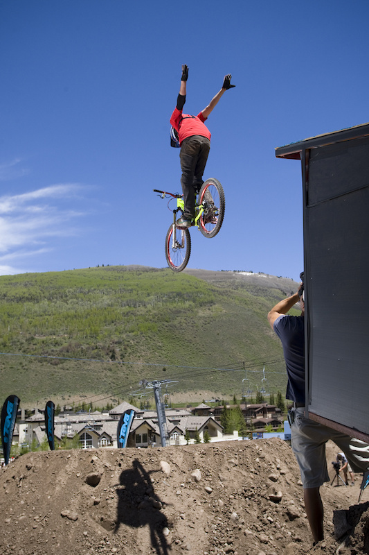 Suicide no hander off the boner drop. I bet the dude standing under the drop has the best 'guy in the sky' photo ever