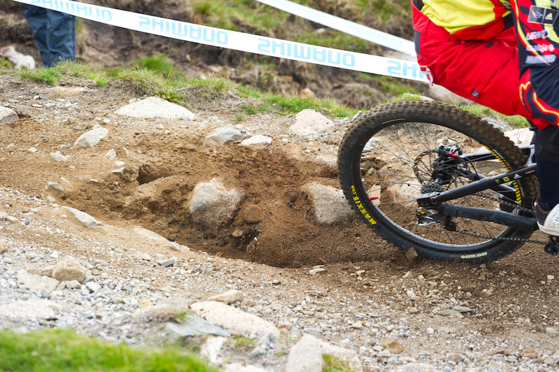 Massive bomb holes began developing, wreaking even more havoc on rider's wheels.