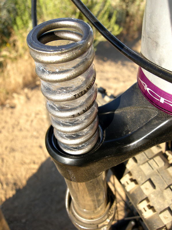 Ti spring with shrink wrap