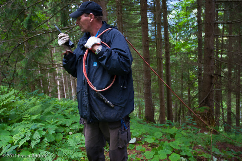 Leogang Austria - World Cup. There s KMs of cable at every World cup. One of Smaragd s TV crew pulls cable while Florian Heller describes a bit of the effort involved. AUDIO - FLORIAN.