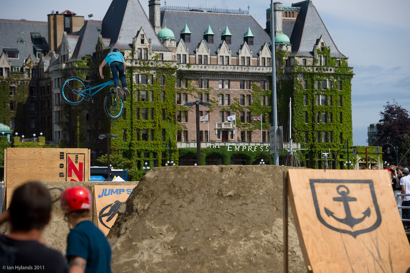 Anthony Messere with a tailwhip in front of the Empress Hotel at Jump Ship in Victoria BC