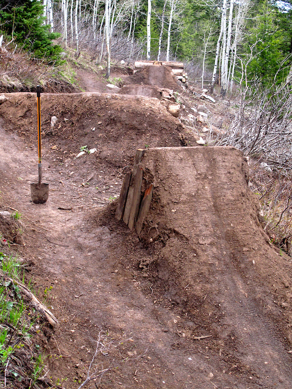 View of the reworked jumps on Parallel Trail on Teton Pass in Jackson Wyoming. May 26 2011